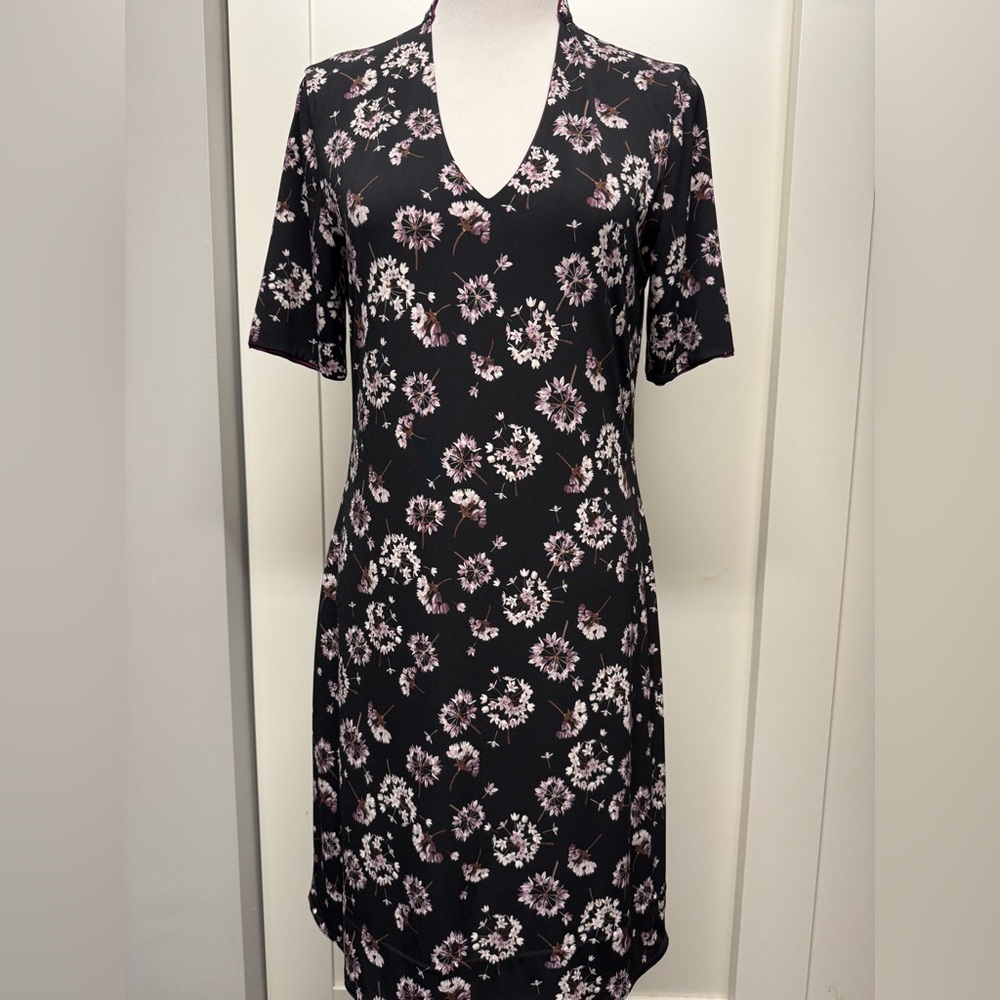 WHBM - Reversible with print on one side and solid color on the other. Size L